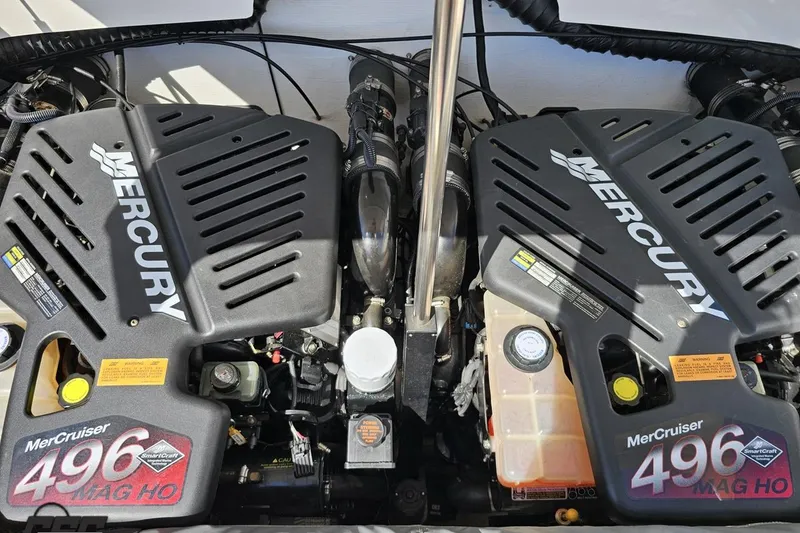 Slide: The Image of Twin Mercury MerCruiser 496 MAG HO engines in a 2001 Powerquest 340 Vyper boat. - 99