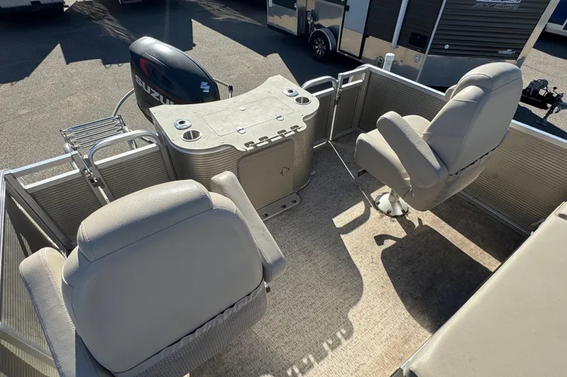 Slide: The Image of 2019 Avalon Catalina Rear Fish boat interior with seating and Suzuki motor. - 10