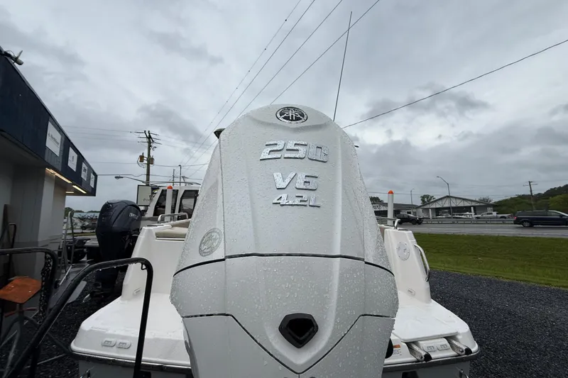 Slide: The Image of 2026 Cutwater C-248 Coupe with Yamaha 250 V6 4.2L engine, parked outdoors. - 10