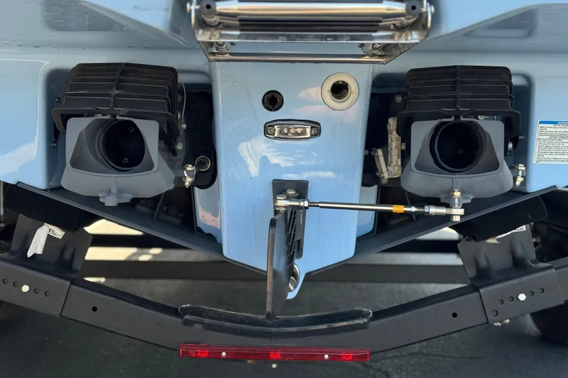 Slide: The Image of Rear view of 2024 Yamaha Boats 252XE jet propulsion system and trailer. - 10