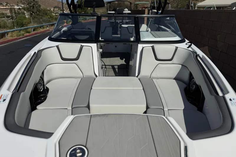Slide: The Image of 2024 Yamaha Boats 252XE interior with sleek seating and modern design. - 14