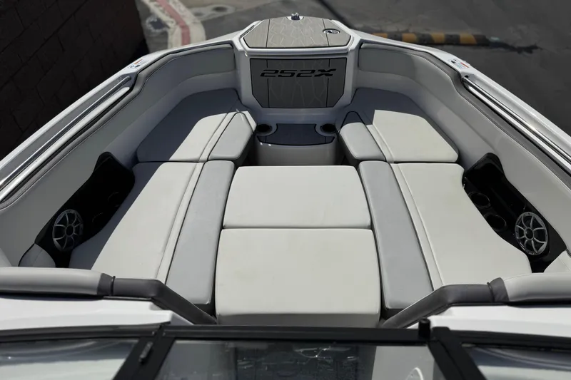 Slide: The Image of 2024 Yamaha Boats 252XE interior with spacious seating and modern design. - 15