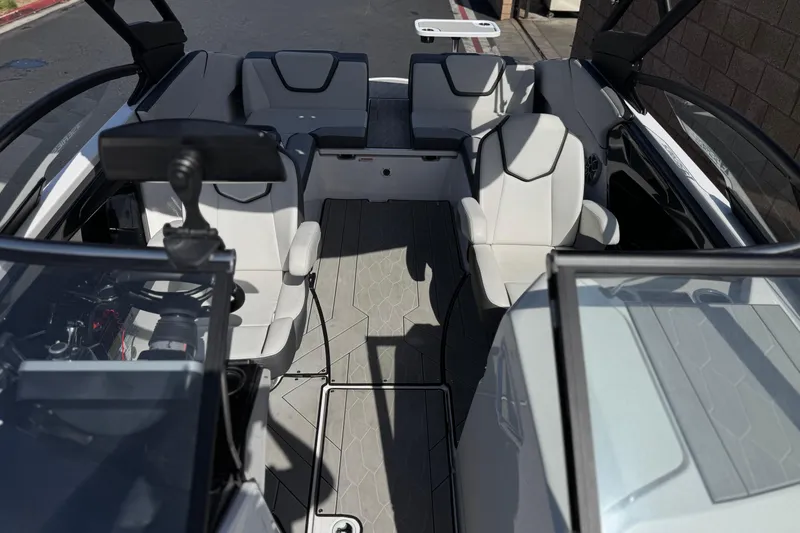 Slide: The Image of 2024 Yamaha Boats 252XE interior with modern seating and sleek design. - 17