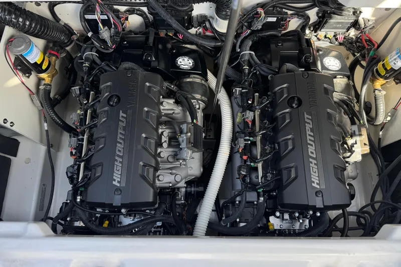 Slide: The Image of 2024 Yamaha Boats 252XE high output engines in a sleek, organized engine compartment. - 24