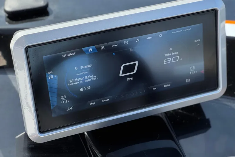 Slide: The Image of 2024 Yamaha Boats 252XE dashboard display showing speed, fuel, and Bluetooth connectivity. - 36