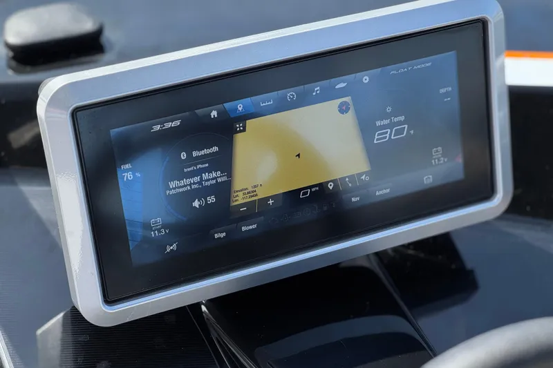 Slide: The Image of Touchscreen display on 2024 Yamaha Boats 252XE showing navigation and audio controls. - 37