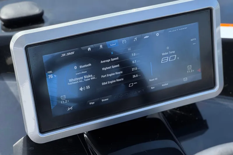Slide: The Image of 2024 Yamaha Boats 252XE touchscreen display showing navigation and engine data. - 38