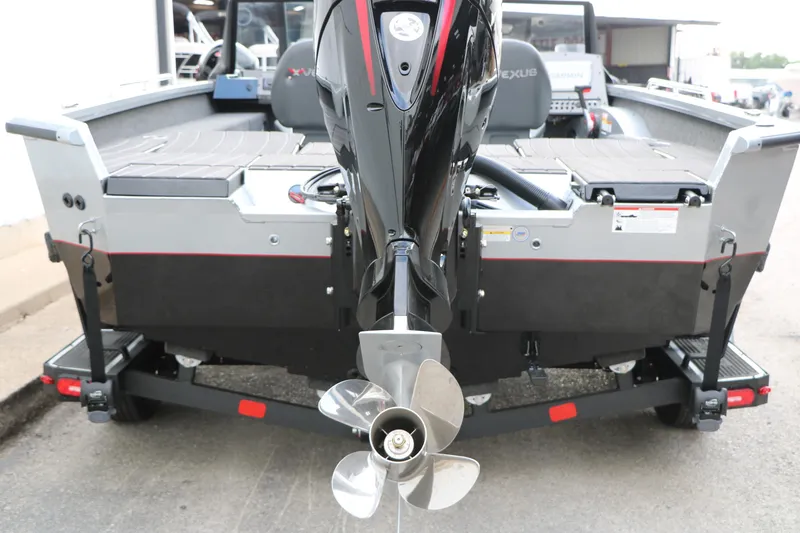 Slide: The Image of 2026 Vexus ADX 190 boat rear view with outboard motor and propeller. - 15