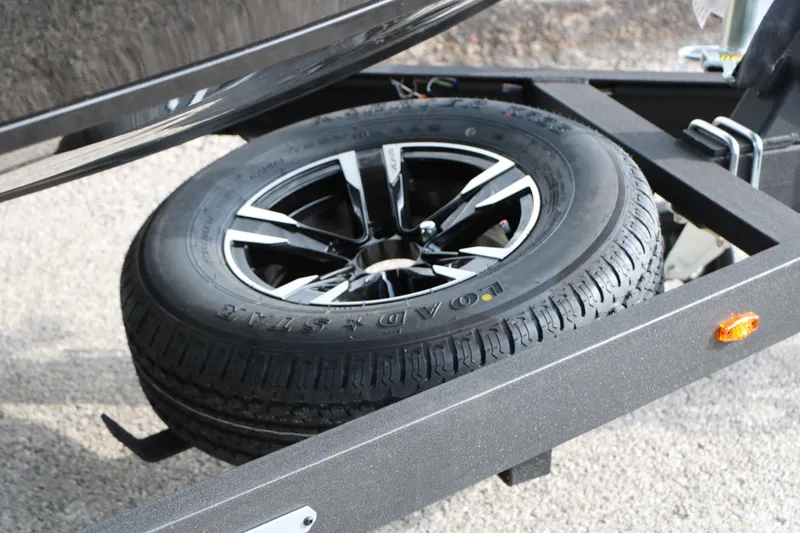 Slide: The Image of Spare tire mounted on a 2026 Vexus ADX 190 trailer frame. - 23