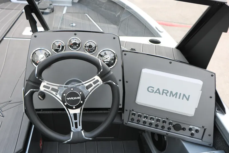 Slide: The Image of Steering console of 2026 Vexus ADX 190 boat with Garmin navigation system. - 25