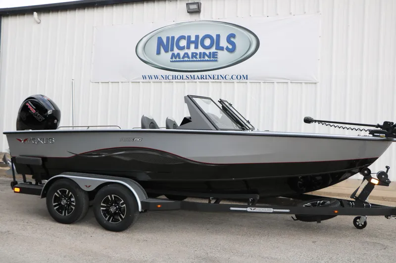 Slide: The Image of 2026 Vexus ADX 190 boat on trailer at Nichols Marine dealership. - 3
