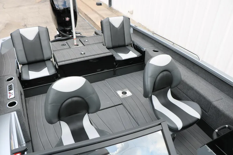 Slide: The Image of 2026 Vexus ADX 190 boat interior with sleek black and gray seating design. - 34
