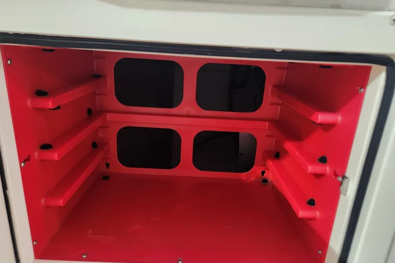 Slide: The Image of White seating on 2007 Grady-White Tournament 225 boat deck. - 17