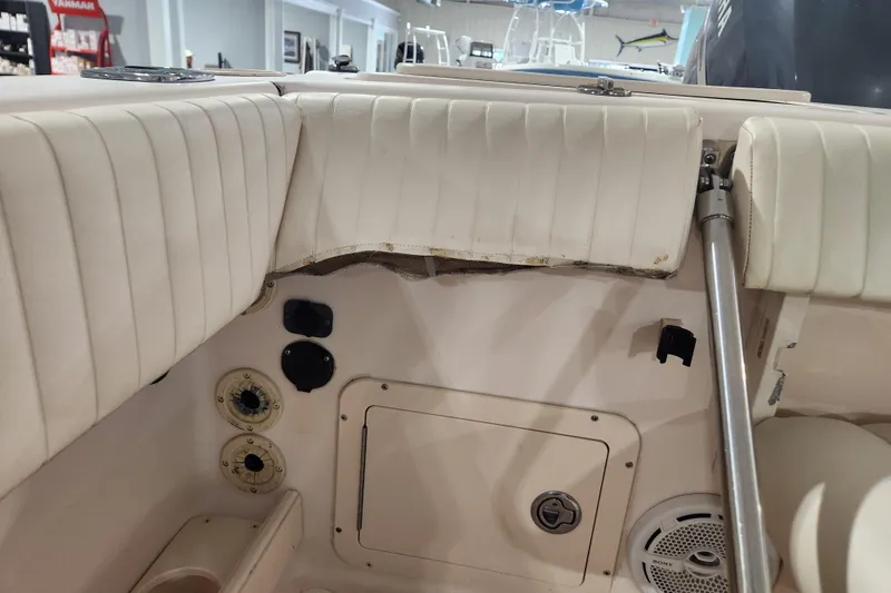 Slide: The Image of Control panel of a 2007 Grady-White Tournament 225 boat with battery switch and Sony speaker. - 22