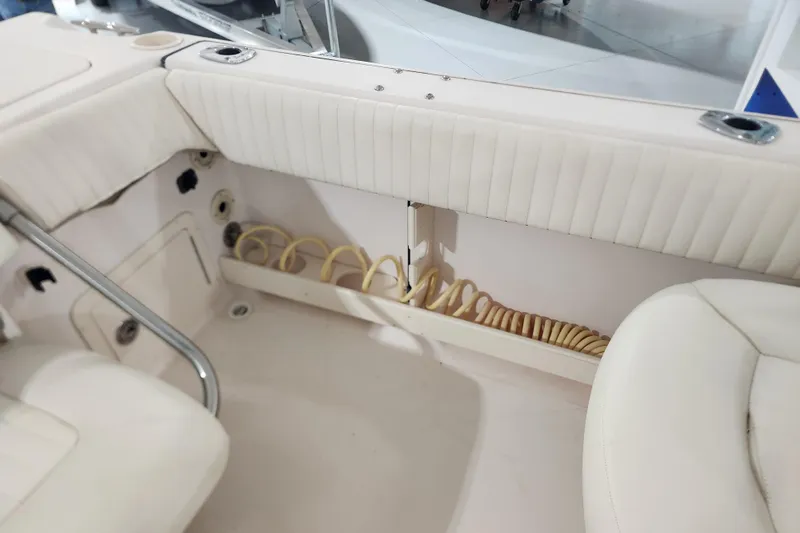 Slide: The Image of Open storage compartment on 2007 Grady-White Tournament 225 boat. - 25