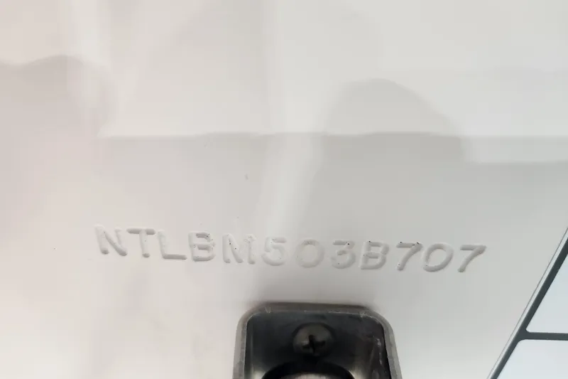 Slide: The Image of Yamaha F250TXR engine label on 2007 Grady-White Tournament 225 boat. - 28