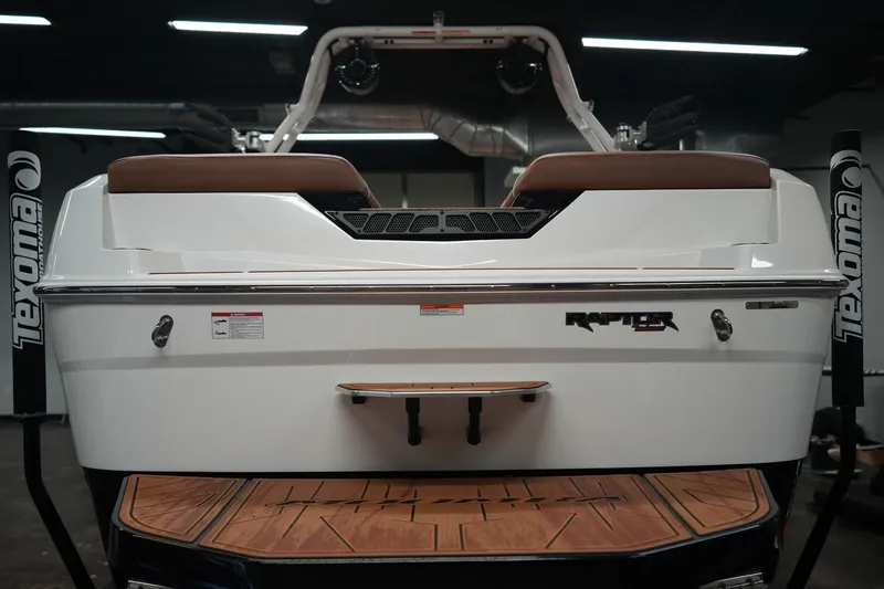 Slide: The Image of Rear view of 2026 Moomba Tykon with Raptor logo. - 10