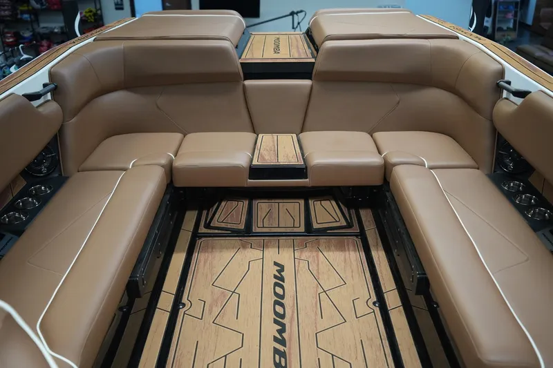 Slide: The Image of Interior of 2026 Moomba Tykon featuring luxurious leather seating. - 14