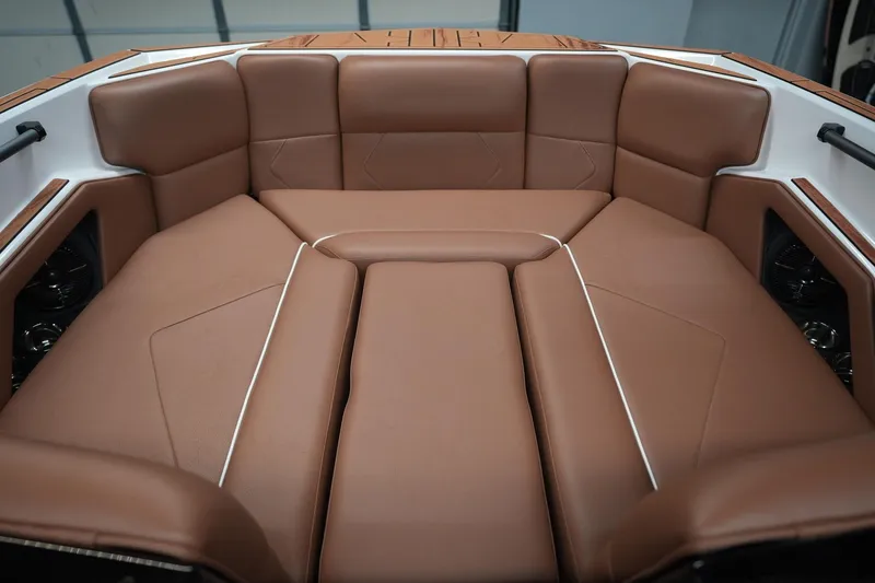 Slide: The Image of Interior of 2026 Moomba Tykon with brown leather seating. - 20