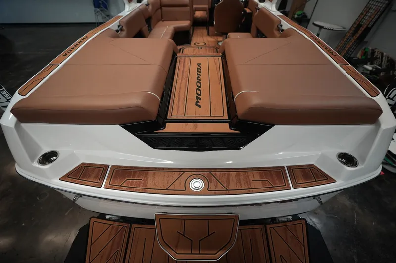 Slide: The Image of 2026 Moomba Tykon boat with luxurious brown interior. - 9