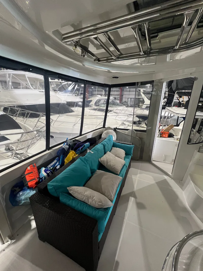 Slide: The Image of Interior of 2002 Carver 466 Motor Yacht with sofa and cushions. - 10
