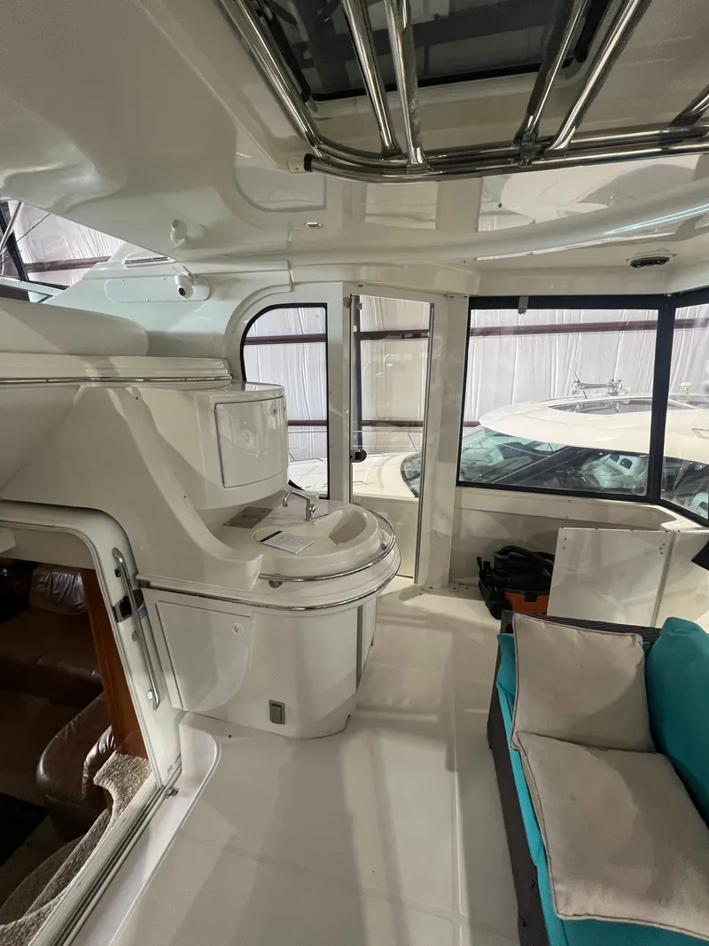 Slide: The Image of Interior of a 2002 Carver 466 Motor Yacht with seating area. - 11