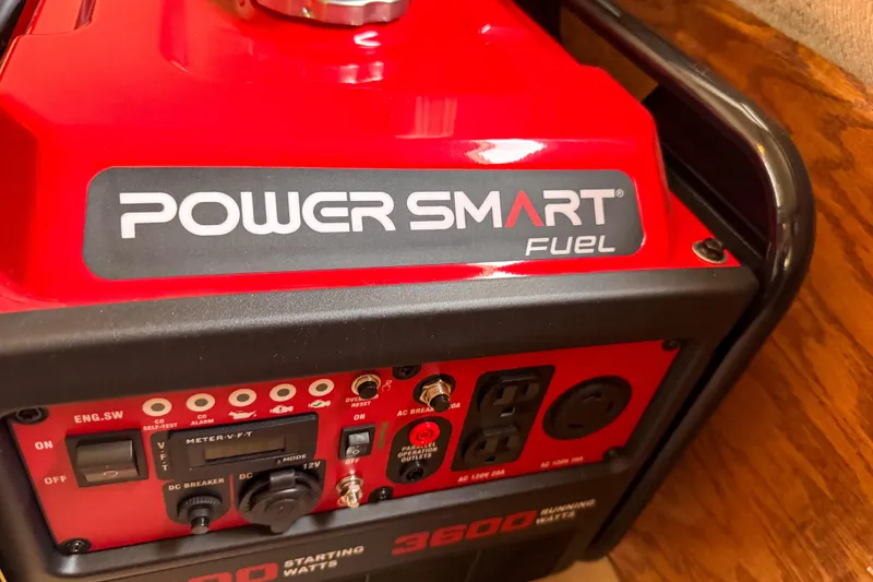 Slide: The Image of Red portable generator inside a 1991 Silverton 41 Aft Cabin boat. - 43