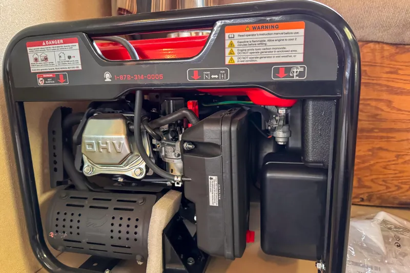 Slide: The Image of Red Power Smart fuel generator with control panel and outlets, Silverton 41 Aft Cabin 1991. - 44