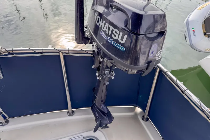 Slide: The Image of Tohatsu outboard motor on 1991 Silverton 41 Aft Cabin boat. - 46
