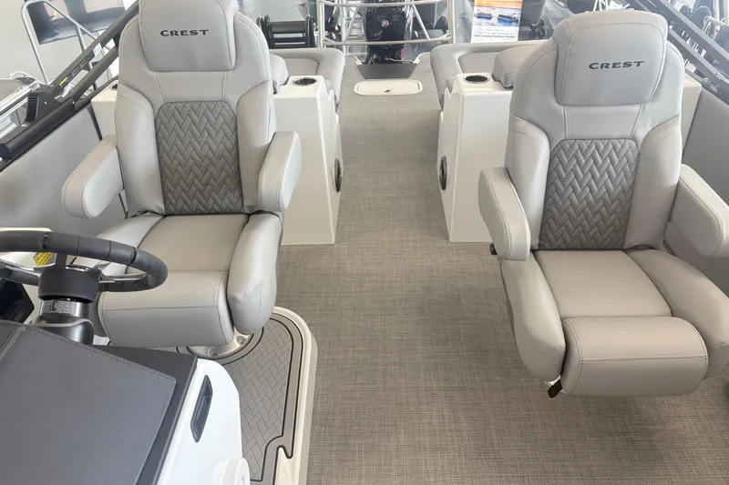 Slide: The Image of Interior of 2026 Crest 230 SLRC Caribbean boat with luxurious seating. - 11