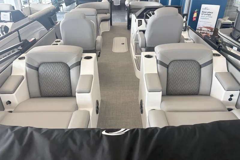 Slide: The Image of Luxurious interior of 2026 Crest 230 SLRC Caribbean boat with plush seating and modern design. - 7