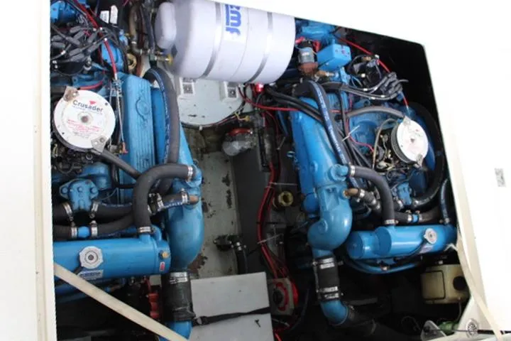 Slide: The Image of Engine compartment of a 1988 Tollycraft 30 Sport Cruiser with dual Crusader engines. - 20