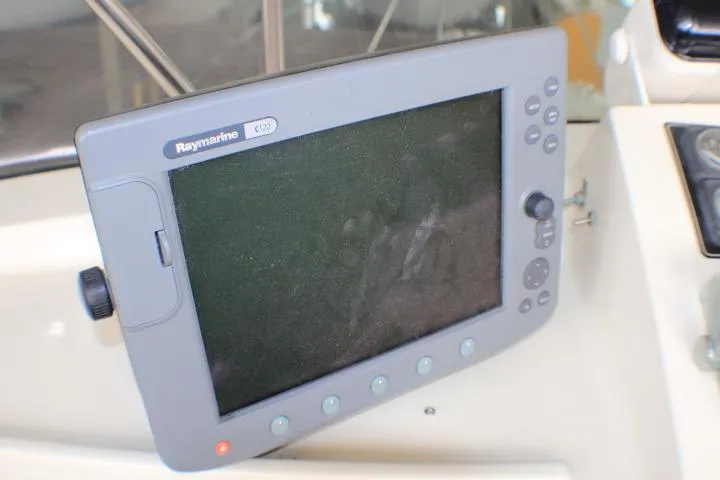 Slide: The Image of Raymarine C120 display on 1988 Tollycraft 30 Sport Cruiser dashboard. - 33