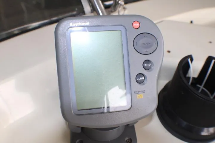 Slide: The Image of Raytheon marine instrument on 1988 Tollycraft 30 Sport Cruiser dashboard. - 34