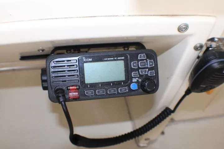 Slide: The Image of VHF marine radio on 1988 Tollycraft 30 Sport Cruiser dashboard. - 35