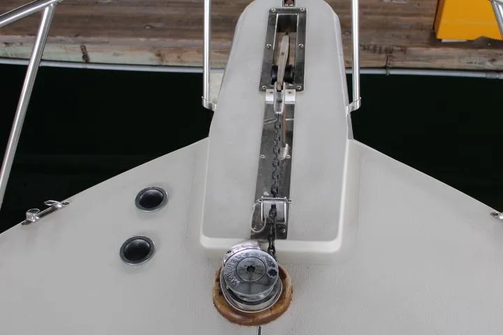 Slide: The Image of Bow of 1988 Tollycraft 30 Sport Cruiser with anchor chain and winch. - 7