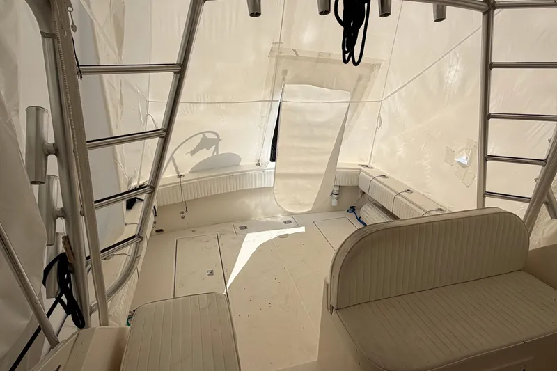 Slide: The Image of Interior view of a 2006 Carolina Classic 28 boat with seating and ladder. - 8