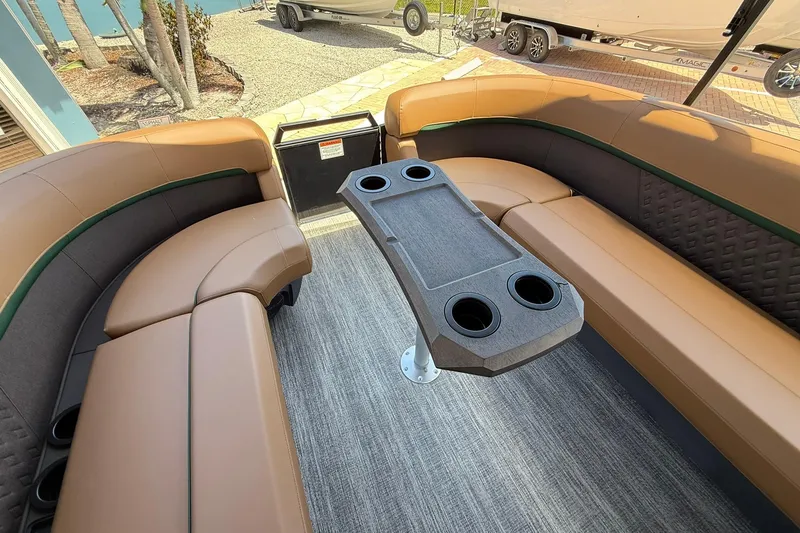 Slide: The Image of Luxurious interior of 2026 Bennington 24 M Quad Bench pontoon boat with plush seating. - 15