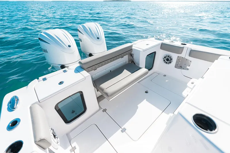 Slide: The Image of Manufacturer Provided Image: 2025 Sportsman Open 282 Center Console boat with dual engines on open water. - 15