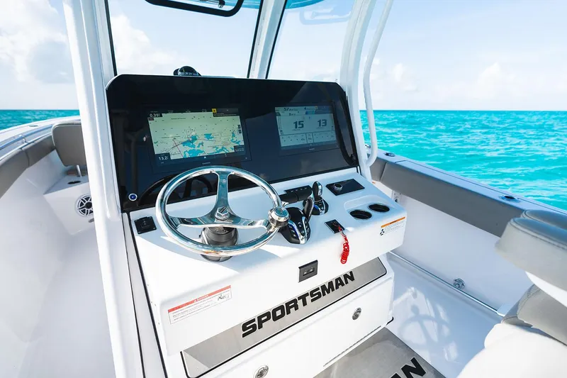 Slide: The Image of Manufacturer Provided Image: 2025 Sportsman Open 302 Center Console boat dashboard with ocean view. - 5