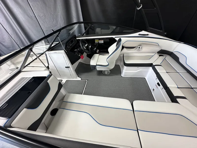Slide: The Image of Interior of a 2019 Yamaha AR210 boat with white seating. - 3