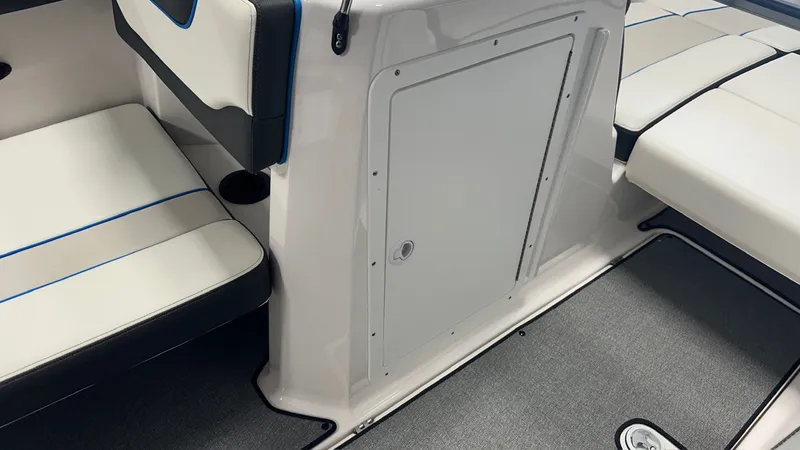 Slide: The Image of Interior of a 2019 Yamaha AR210 boat with white seating. - 46