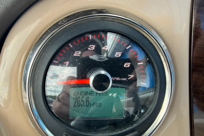 Slide: The Image of Tachometer of 2021 Chaparral 23 SSi showing 265.6 engine hours. - 21