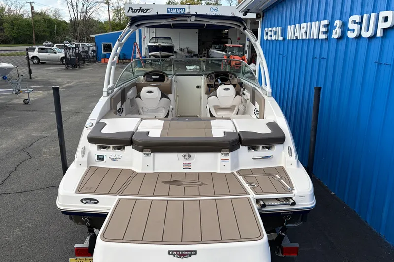 Slide: The Image of 2021 Chaparral 23 SSi boat at Cecil Marine & Supply, showcasing spacious deck and seating. - 4