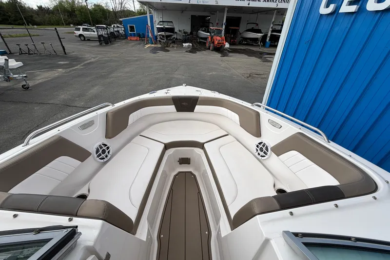 Slide: The Image of 2021 Chaparral 23 SSi boat interior with spacious seating and modern design. - 7