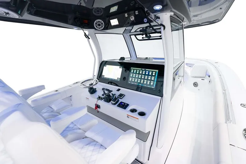 Slide: The Image of Manufacturer Provided Image: 2025 Sportsman Open 352 Center Console boat interior with advanced navigation system. - 9