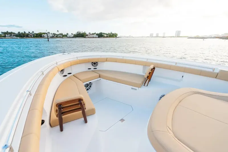 Slide: The Image of Manufacturer Provided Image: 2026 Sportsman Open 402 Center Console boat with spacious seating, cruising on calm waters. - 3