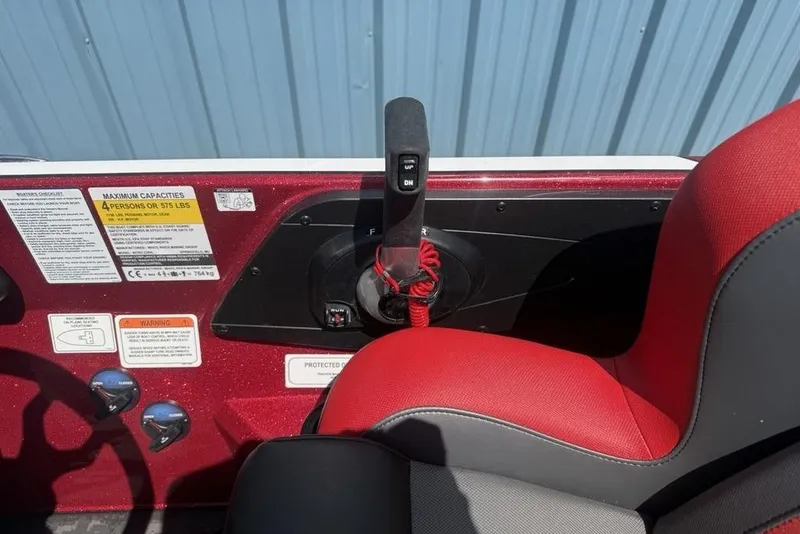 Slide: The Image of 2026 Nitro Z20 XL Pro boat cockpit with red seat and control panel. - 10