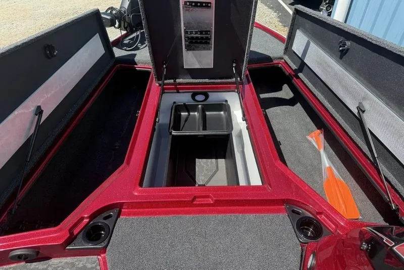 Slide: The Image of 2026 Nitro Z20 XL Pro boat storage compartments with open lids and visible interior. - 13