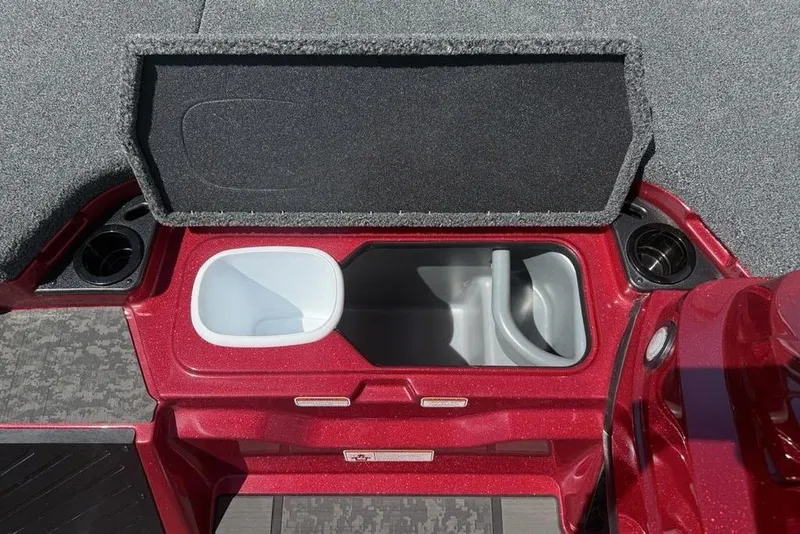Slide: The Image of Open storage compartment in 2026 Nitro Z20 XL Pro boat, featuring cup holders and sleek design. - 15